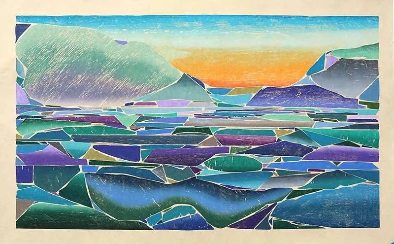 A wood relief of rolling ocean waves built from layered wood fragments